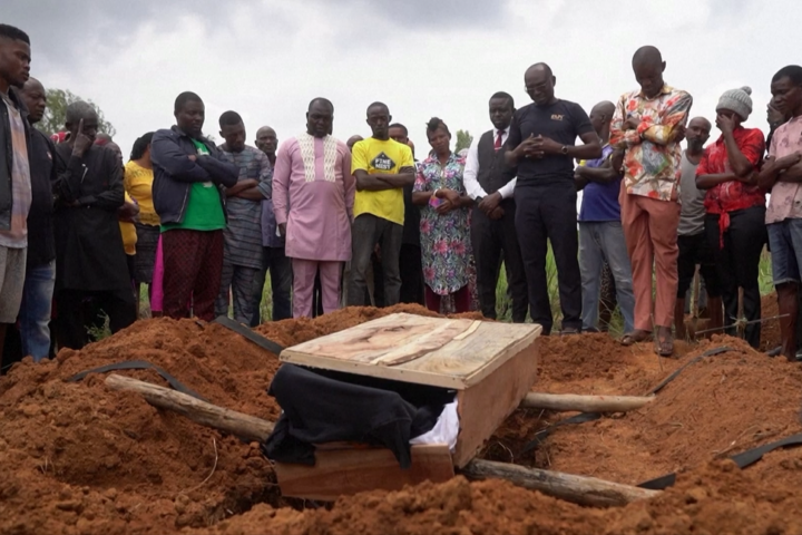 Families bury loved ones following school building collapse in Jos