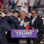 Trump rushed off stage after shots ring out at rally