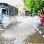 In India, record rainfall follows stifling heat